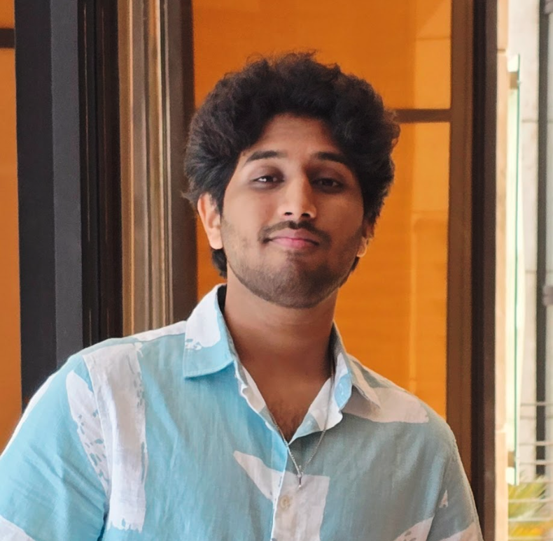 Headshot of Ashish Ajin Thomas